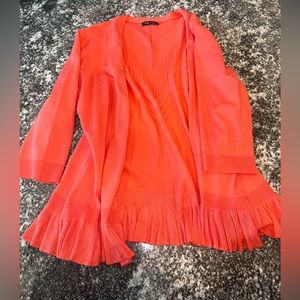 Women’s orange ruffle cardigan